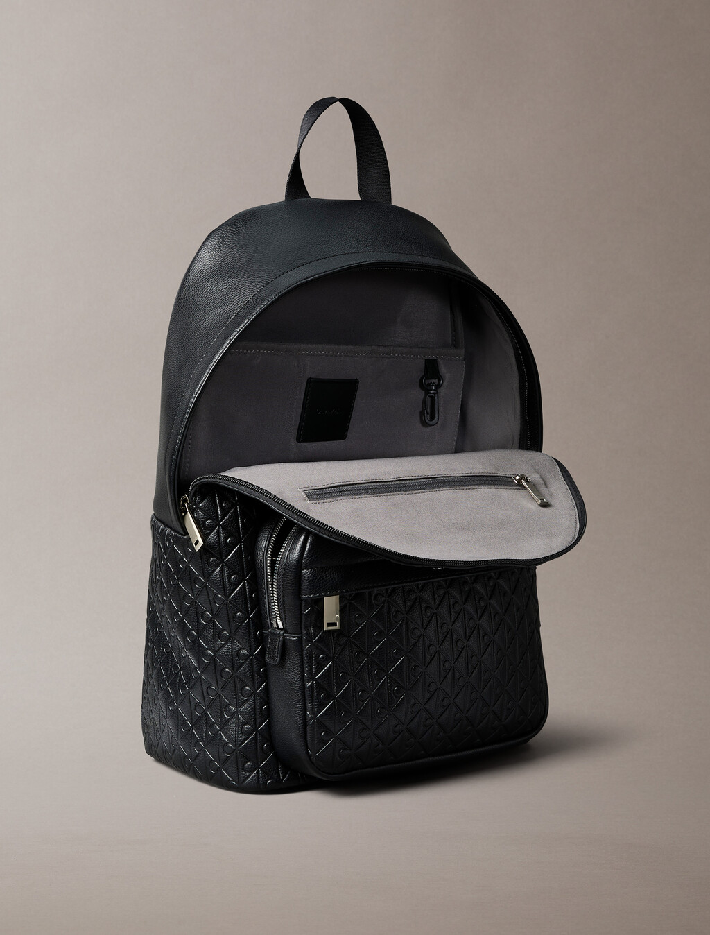 Embossed Allover Monogram Backpack, Black, hi-res