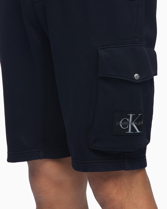 ORGANIC COTTON MONOGRAM BADGE SWEAT SHORTS
