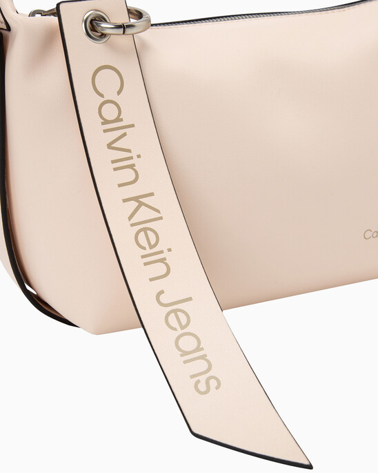 SCULPTED ROUND BAG WITH LOGO TAG
