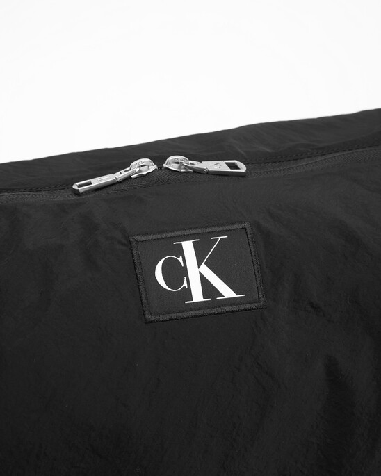 CK CITY CINCHED SLING BAG
