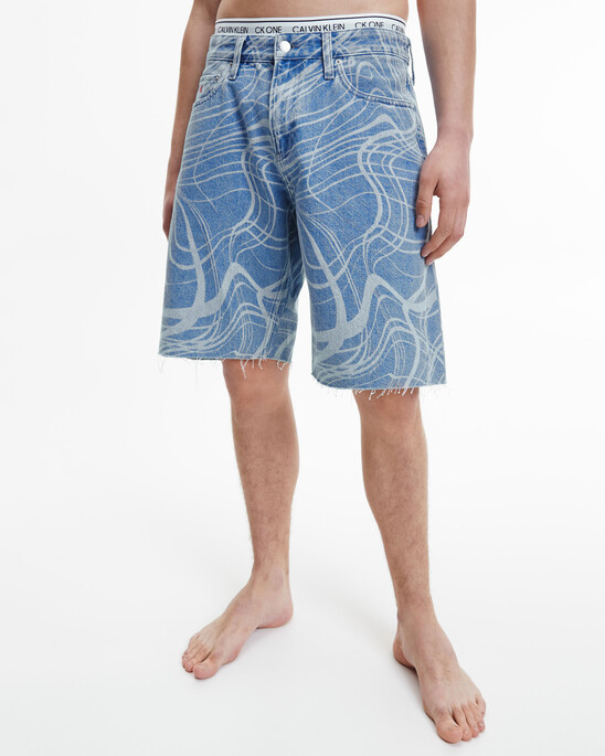 CK ONE DISRUPTED LOGO WIDE DENIM SHORTS