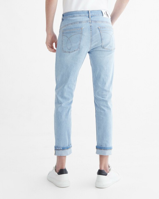 Infinite Flex Distressed Body Taper Jeans