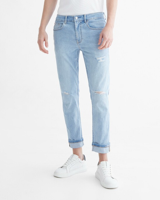 Infinite Flex Distressed Body Taper Jeans
