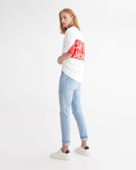 Infinite Flex Distressed Body Taper Jeans