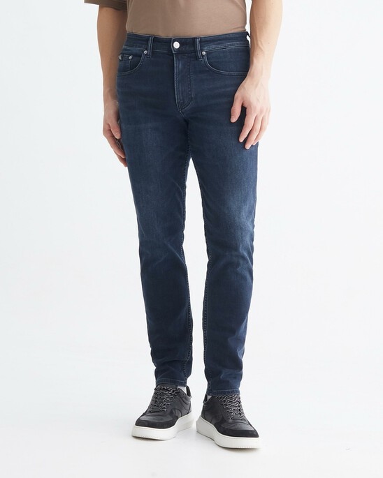 RECONSIDERED BLUE BLACK BODY TAPER JEANS