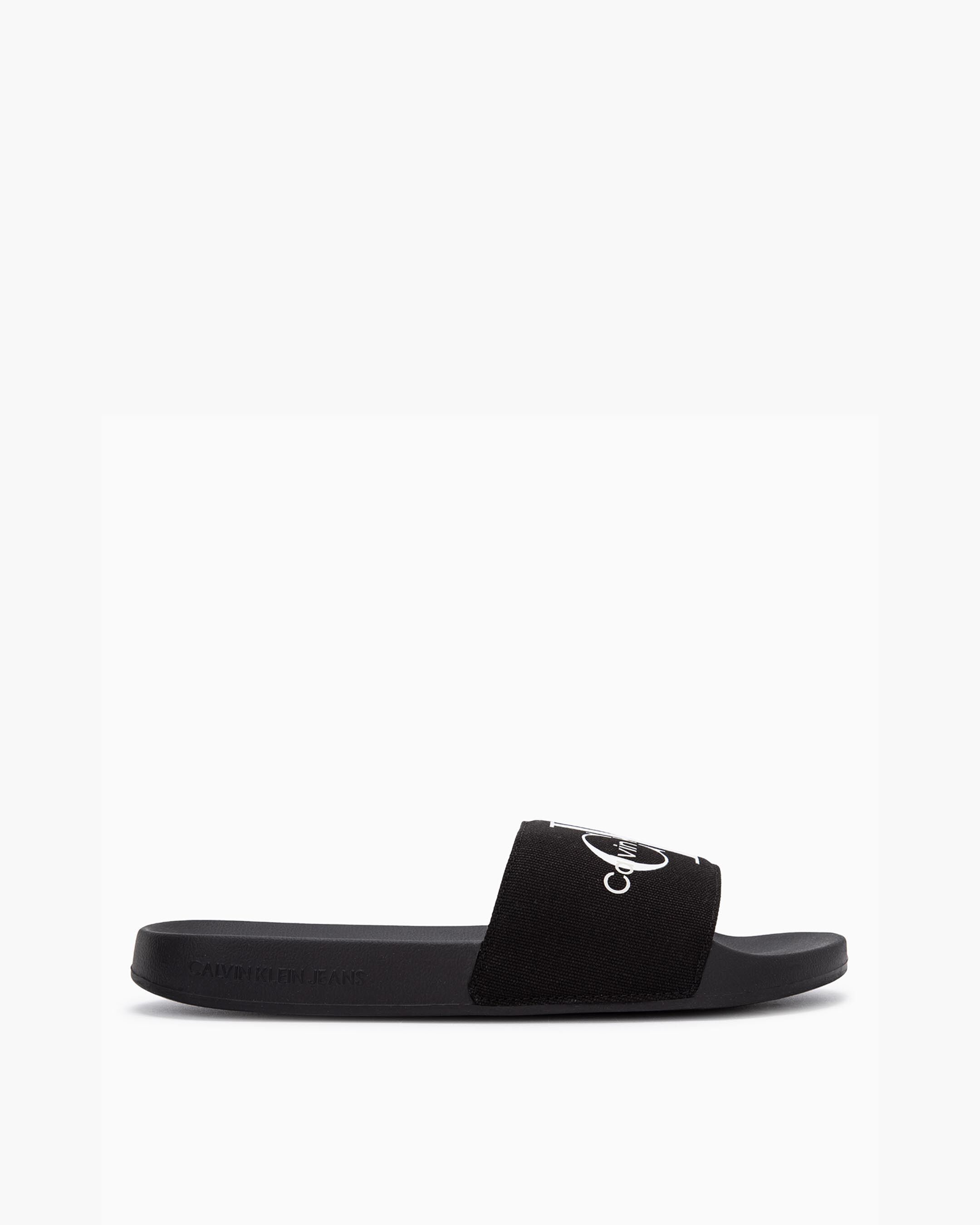 White calvin klein discount slides