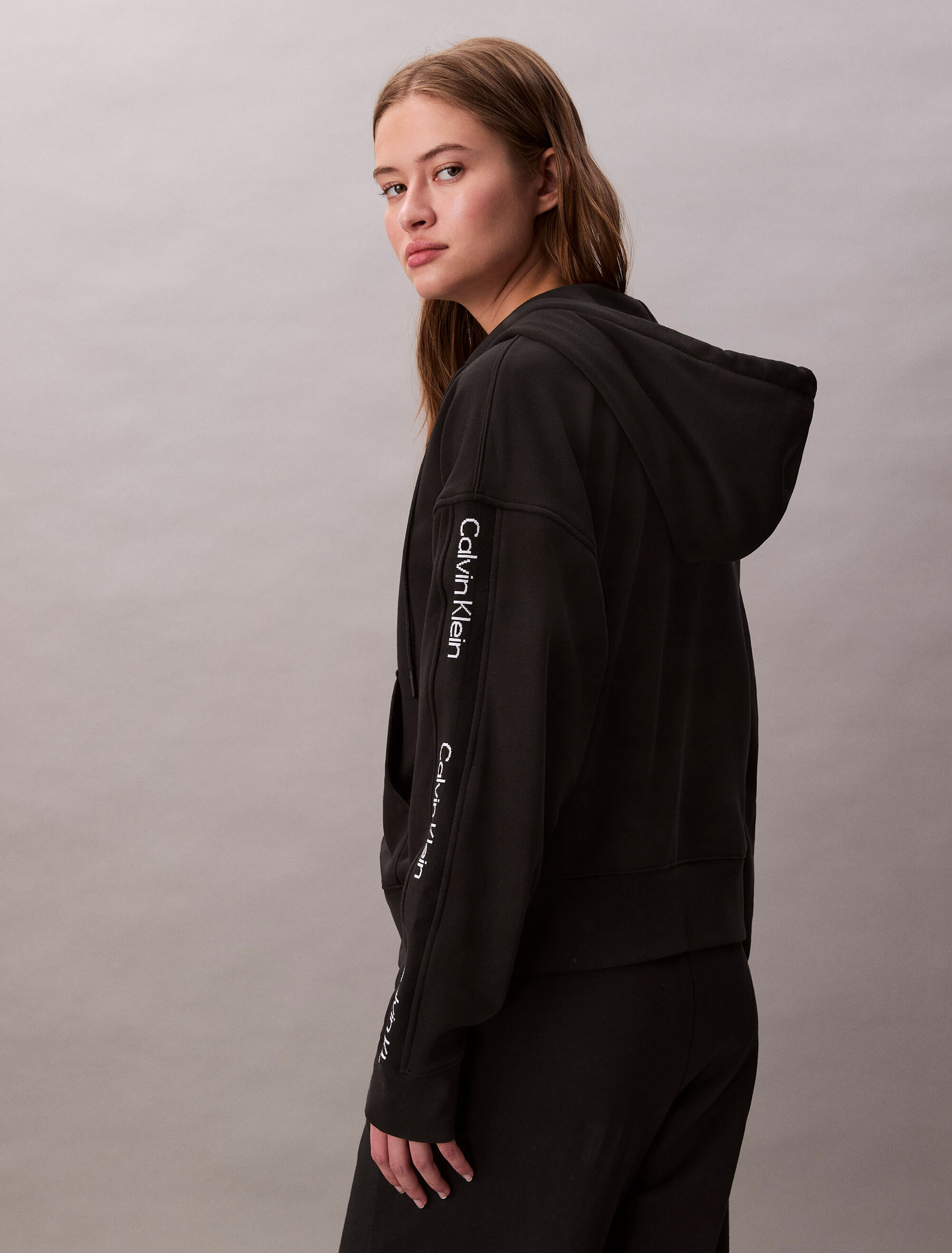 Logo Tape Terry Zip Thru Hoodie | black | Calvin Klein Singapore