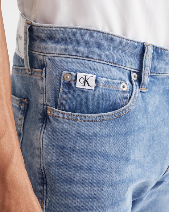 Ultimate Stretch Distressed Slim Jeans