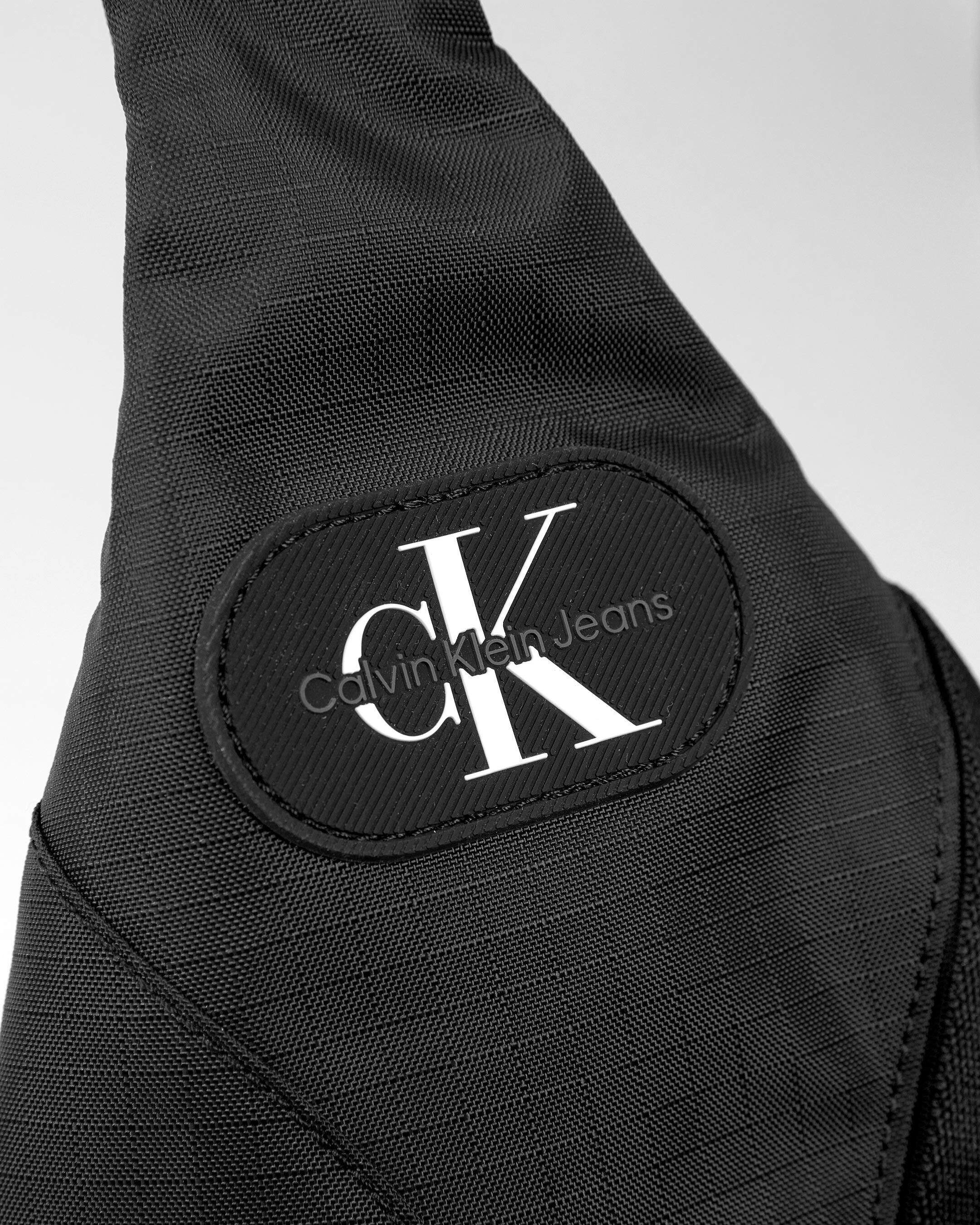 Calvin klein round signature crossbody store