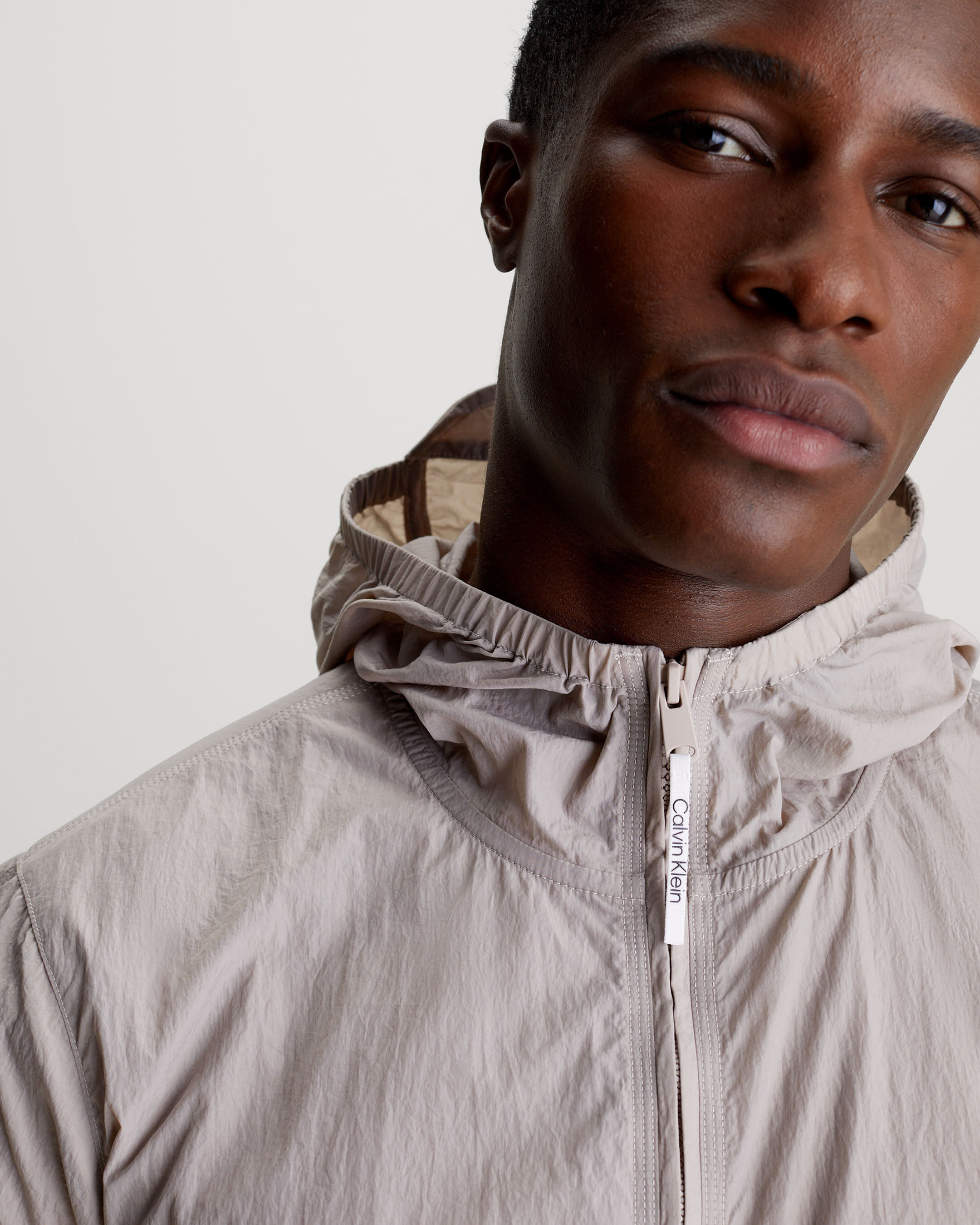 Men's hooded windbreaker top