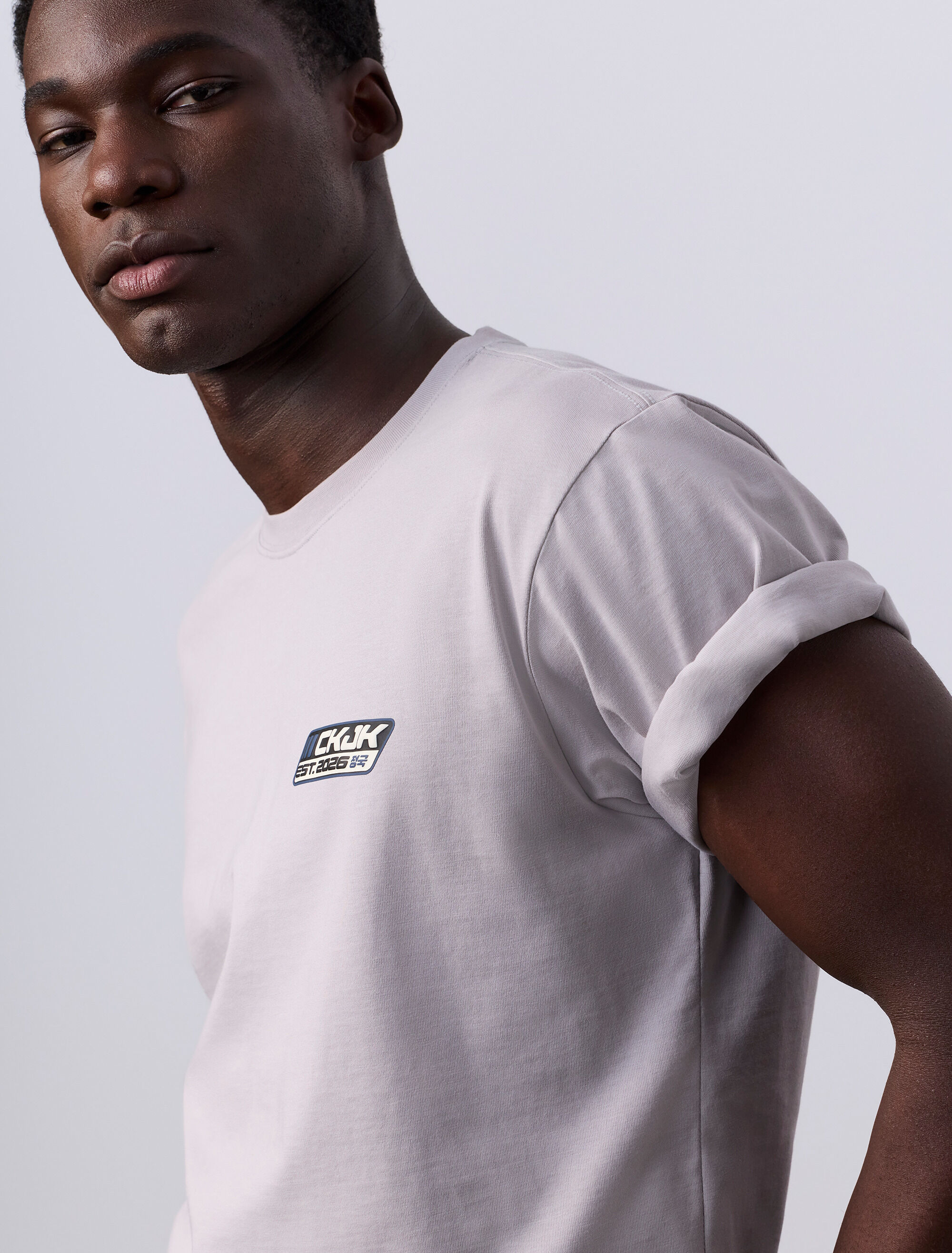 Jung Kook for Calvin Klein Logo Badge Relaxed T-Shirt | grey