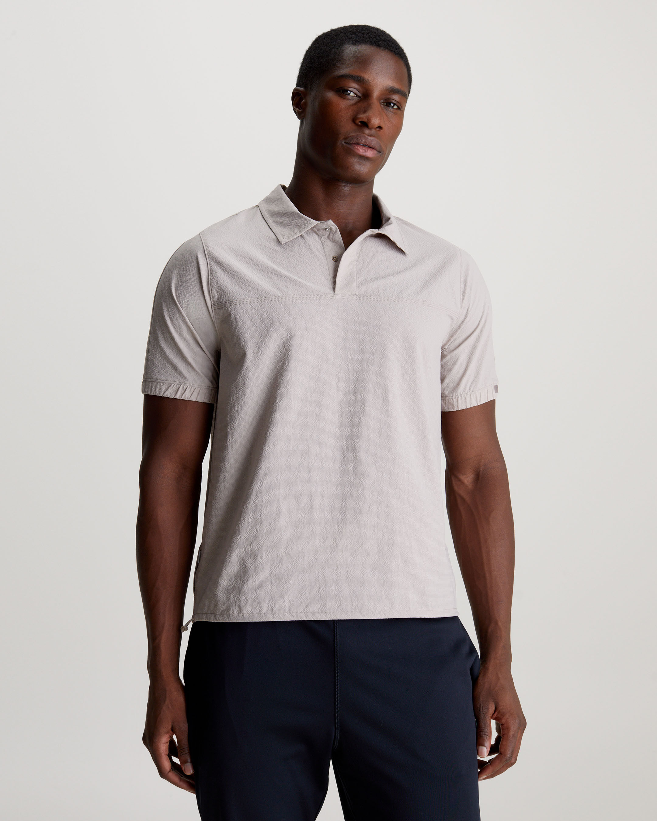 White zip shop up polo shirt